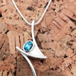 Oval Blue Topaz Pendant in Sterling Silver