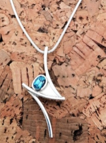 Oval Blue Topaz Pendant in Sterling Silver